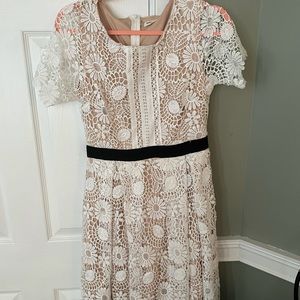 White lace below the knee dress